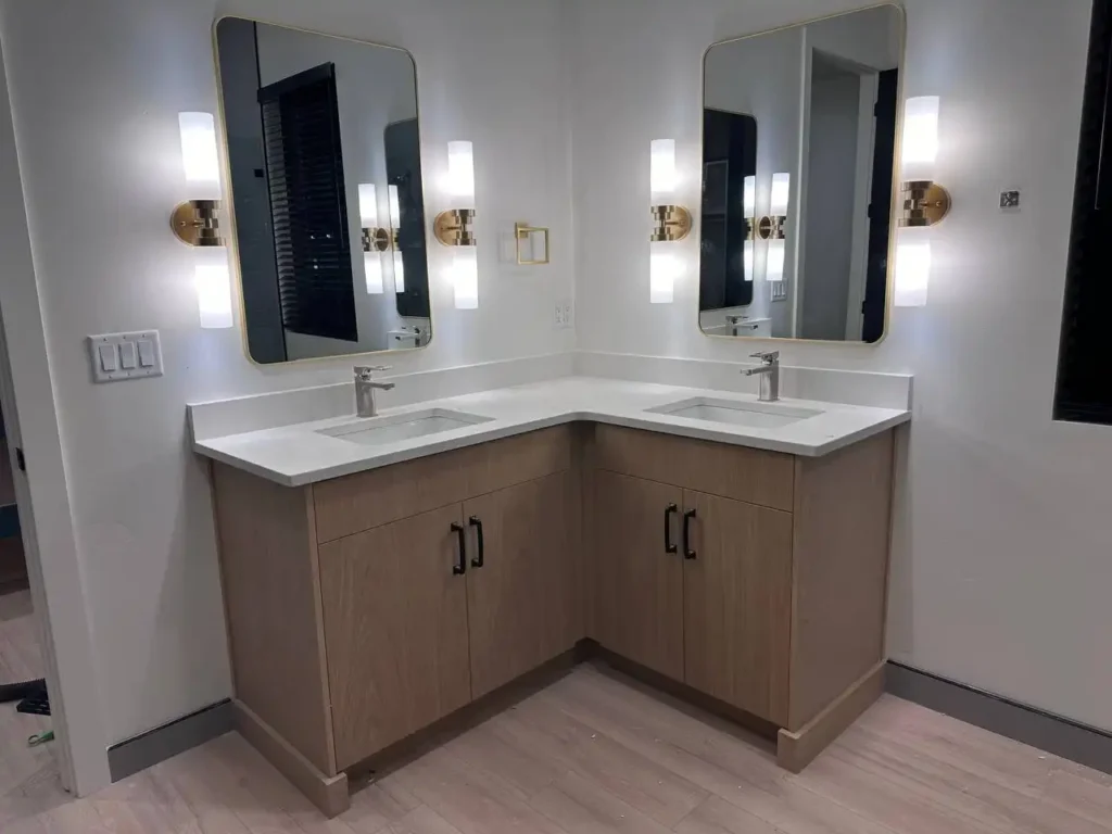 Customized Corner His and Her Bathroom Sink with Birch Cabinets in a Saint George Home