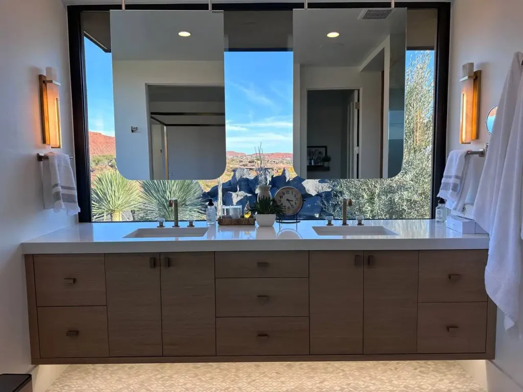 Looking Out Bathroom with Under the Sink Wooden Flushed Storages in Saint George Mansion